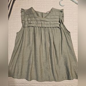 Sleeveless ruffled blouse